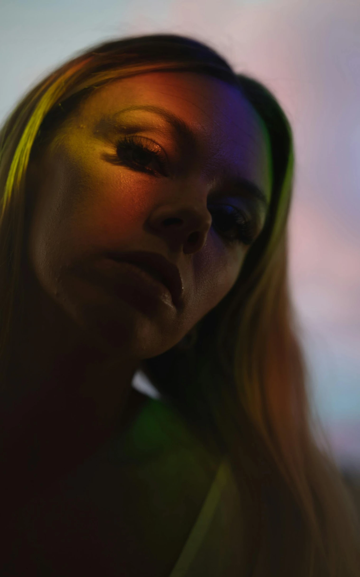 a close up of a woman with long hair, inspired by Elsa Bleda, under a technicolor sky, anya taylor joy, low - light photograph, digital image