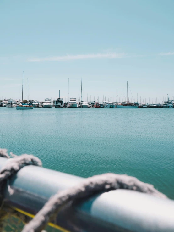 a large body of water filled with lots of boats, pexels contest winner, lachlan bailey, trending on vsco, 8k 50mm iso 10, crisp lines