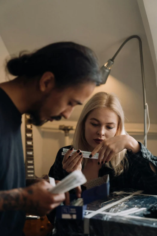 a couple of people that are in a room, by Christen Dalsgaard, pexels contest winner, holding a syringe, stoner, low quality footage, profile image