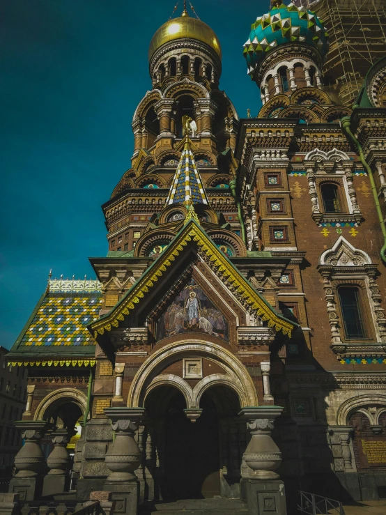 a tall building with a golden dome on top of it, inspired by Vasily Surikov, pexels contest winner, baroque, detailed color scan”, brown, square, deep vivid colors