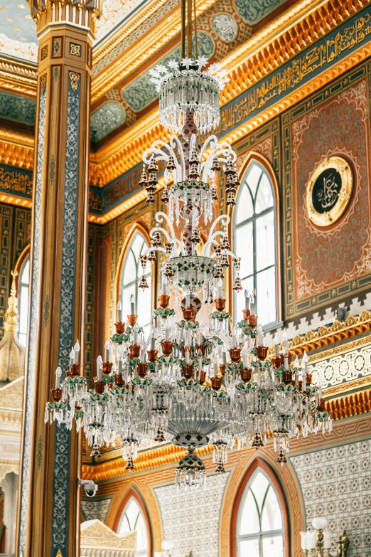 a chandelier hanging from the ceiling of a building, inspired by Osman Hamdi Bey, trending on unsplash, baroque, 2 5 6 x 2 5 6 pixels, ornate furniture, arper's bazaar, high ceilings