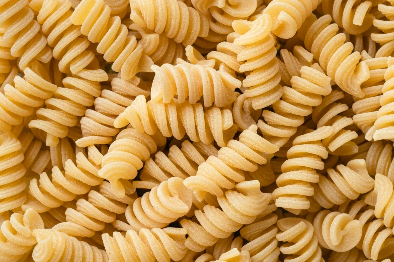 a close up of a pile of pasta, oganic rippling spirals, extra crisp image, corduroy, crisp image