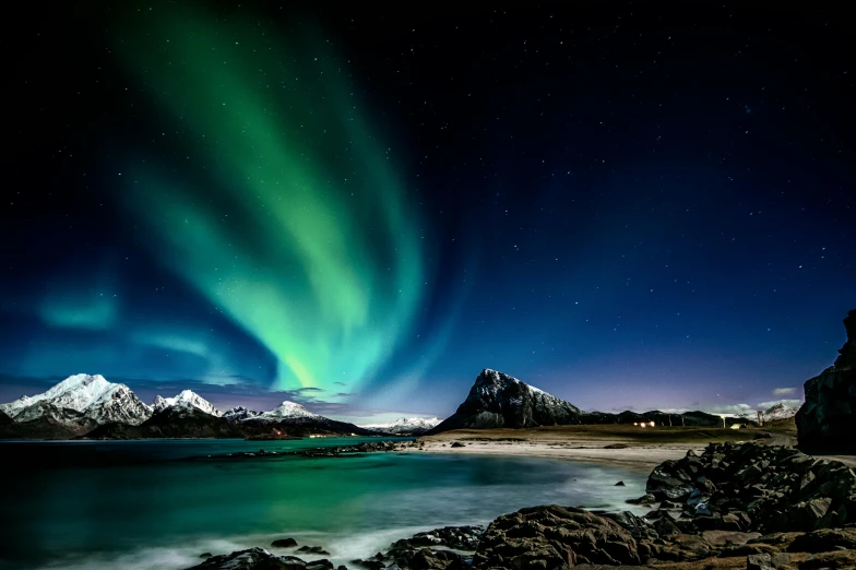 the aurora lights in the sky over a body of water, pexels contest winner, hurufiyya, mountains and ocean, blue and green, threyda, black