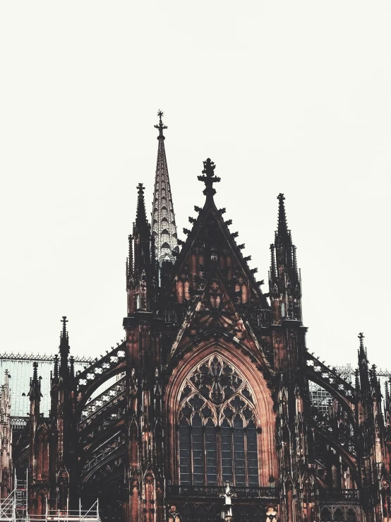 a couple of people that are standing in front of a building, inspired by Albert Paris Gütersloh, pexels contest winner, international gothic, cathedral!!!!!, spines and towers, germany, 🚿🗝📝