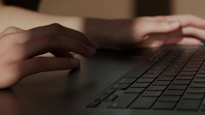 a close up of a person typing on a laptop, by Carey Morris, with photorealistic lighting, thumbnail, magic hour lighting, apple