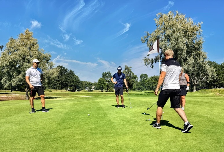 a group of people playing a game of golf, by Tom Wänerstrand, pexels contest winner, happening, avatar image, summer day, leg and hip shot, profile image