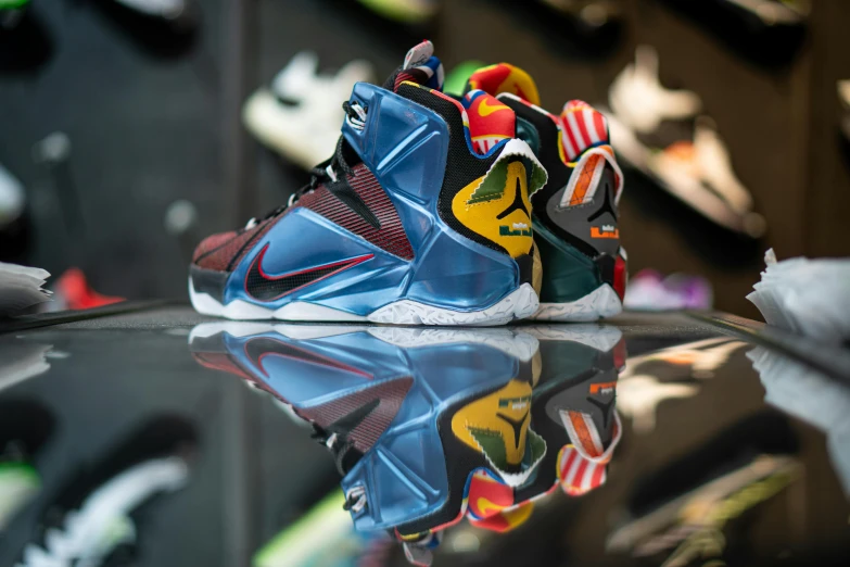 a pair of sneakers sitting on top of a glass table, lebron james, multi colour, panels, extremely polished