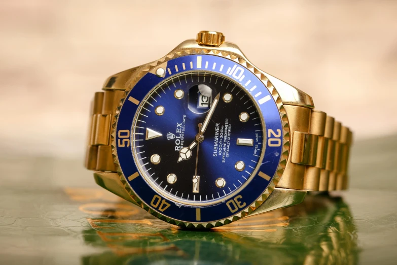 a close up of a watch on a table, pexels contest winner, renaissance, ultramarine blue and gold, rolex, blue submarine no 6, realistic »