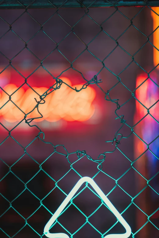 a close up of a sign on a fence, an album cover, inspired by Elsa Bleda, glowing cracks, neon virtual networks, torn mesh, trending photo