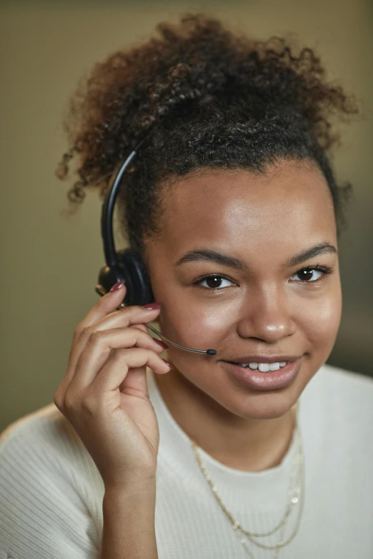 a close up of a person wearing a headset, detailed product image, modeled, student, mixed race