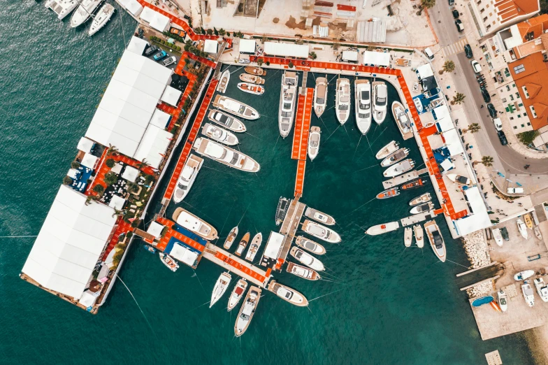 a marina filled with lots of white and red boats, a digital rendering, pexels contest winner, orange and white color scheme, flatlay, boka, 🦩🪐🐞👩🏻🦳