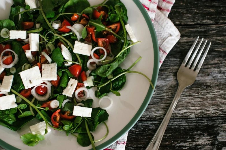 a close up of a plate of food on a table, pexels, salad, square, plenty mozzarella, thumbnail