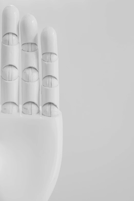 a close up of a white robotic hand, an ambient occlusion render, by Adam Marczyński, unsplash, made of plastic, white sleeves, high key, read