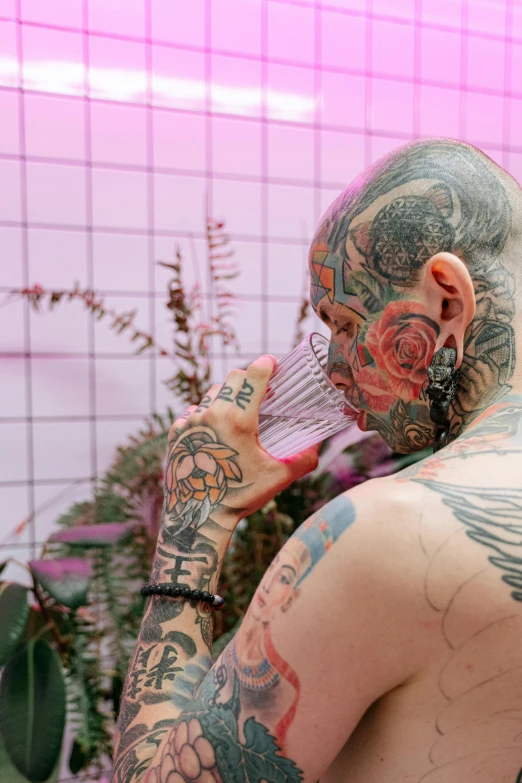 a man with tattoos combing his hair, a tattoo, by Jessie Alexandra Dick, pexels contest winner, an alien drinking horchata, non binary future world, james jean and jenny saville, slide show