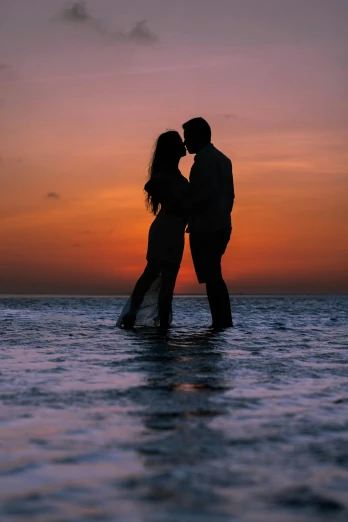 a couple kissing in the ocean at sunset, by Robbie Trevino, pexels contest winner, close full body shot, 15081959 21121991 01012000 4k, 5 0 0 px models, aruba