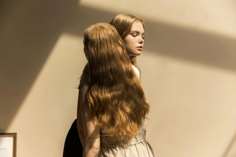 a couple of women standing next to each other, by irakli nadar, trending on unsplash, photorealism, light brown long wavy hair, erwin olaf, hands in her hair. side-view, sunlit