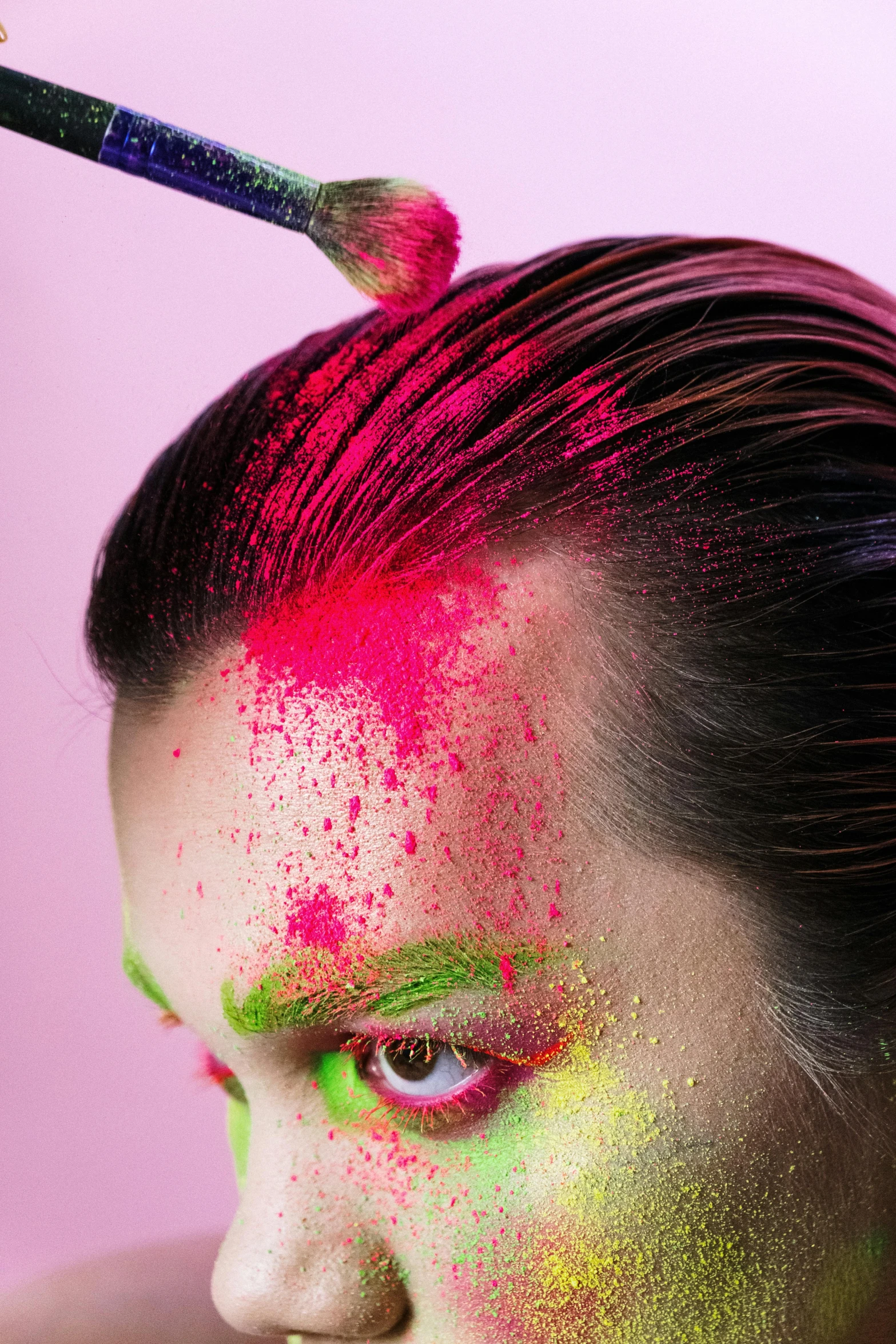 a close up of a person with paint on their face, an album cover, inspired by Russell Dongjun Lu, pink mohawk, fluo details, bird poo on head, brainbow