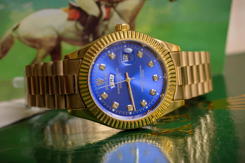 a close up of a watch on a table, pexels contest winner, renaissance, golden blue outfit, thumbnail, ralph horsley vivid color, louisiana