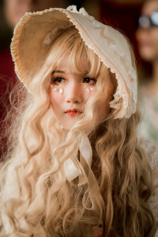 a woman with long blonde hair wearing a hat, inspired by Elsa Bleda, rococo, yanjun chengt, doll face, fluffy hair, movie photo