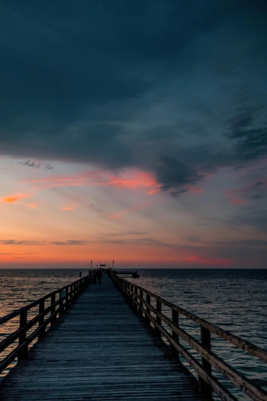 a pier stretching out into the ocean at sunset, by Daniel Seghers, multicolored, color ( sony a 7 r iv, 2 5 6 x 2 5 6 pixels, unedited