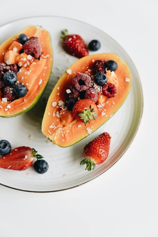a plate that has some fruit on it, unsplash, wearing a melon, squashed berries, opening shot, recipe