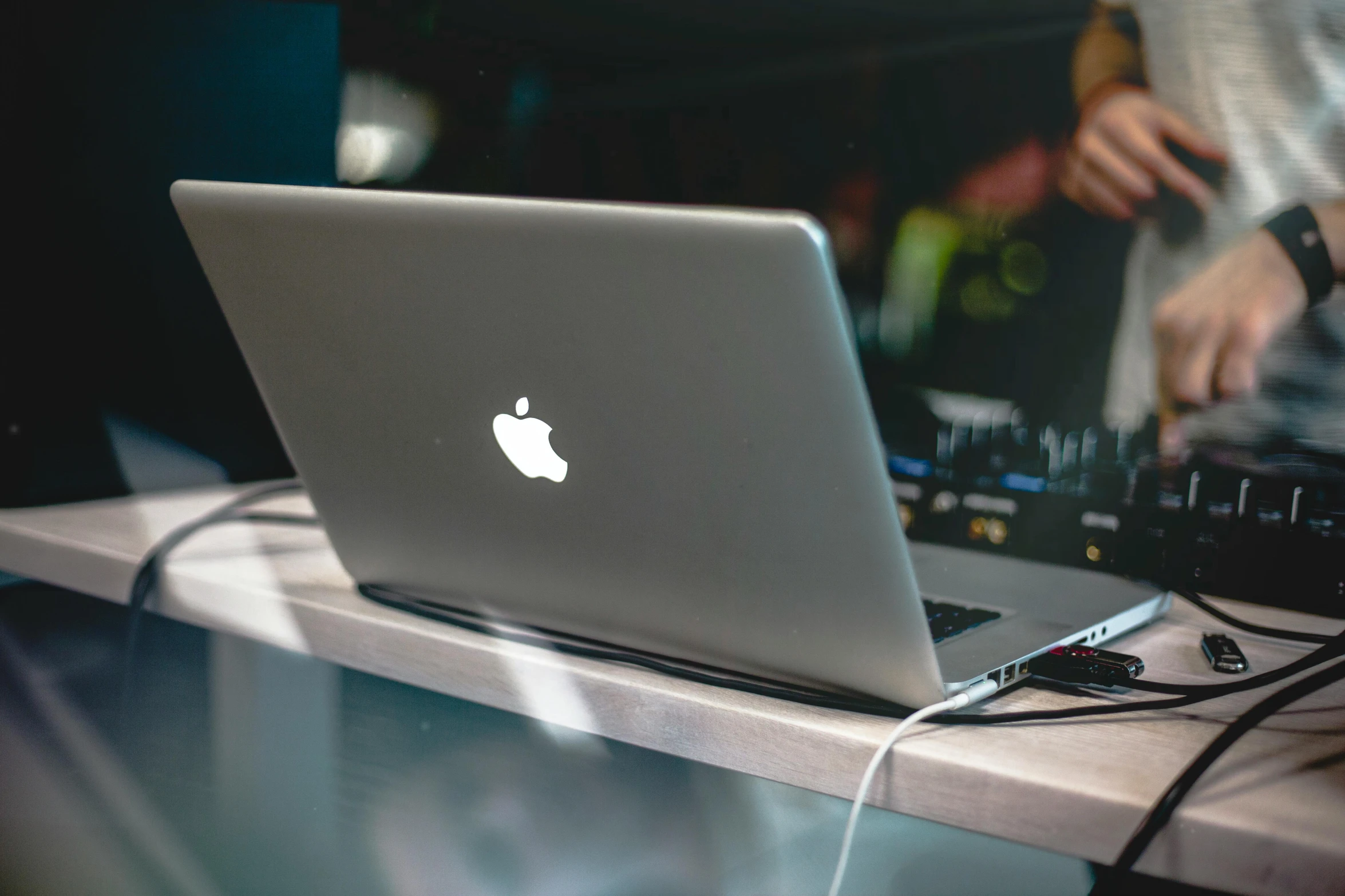 a laptop computer sitting on top of a table, by Robbie Trevino, pexels, apple logo, server in the middle, intense detail, various posed