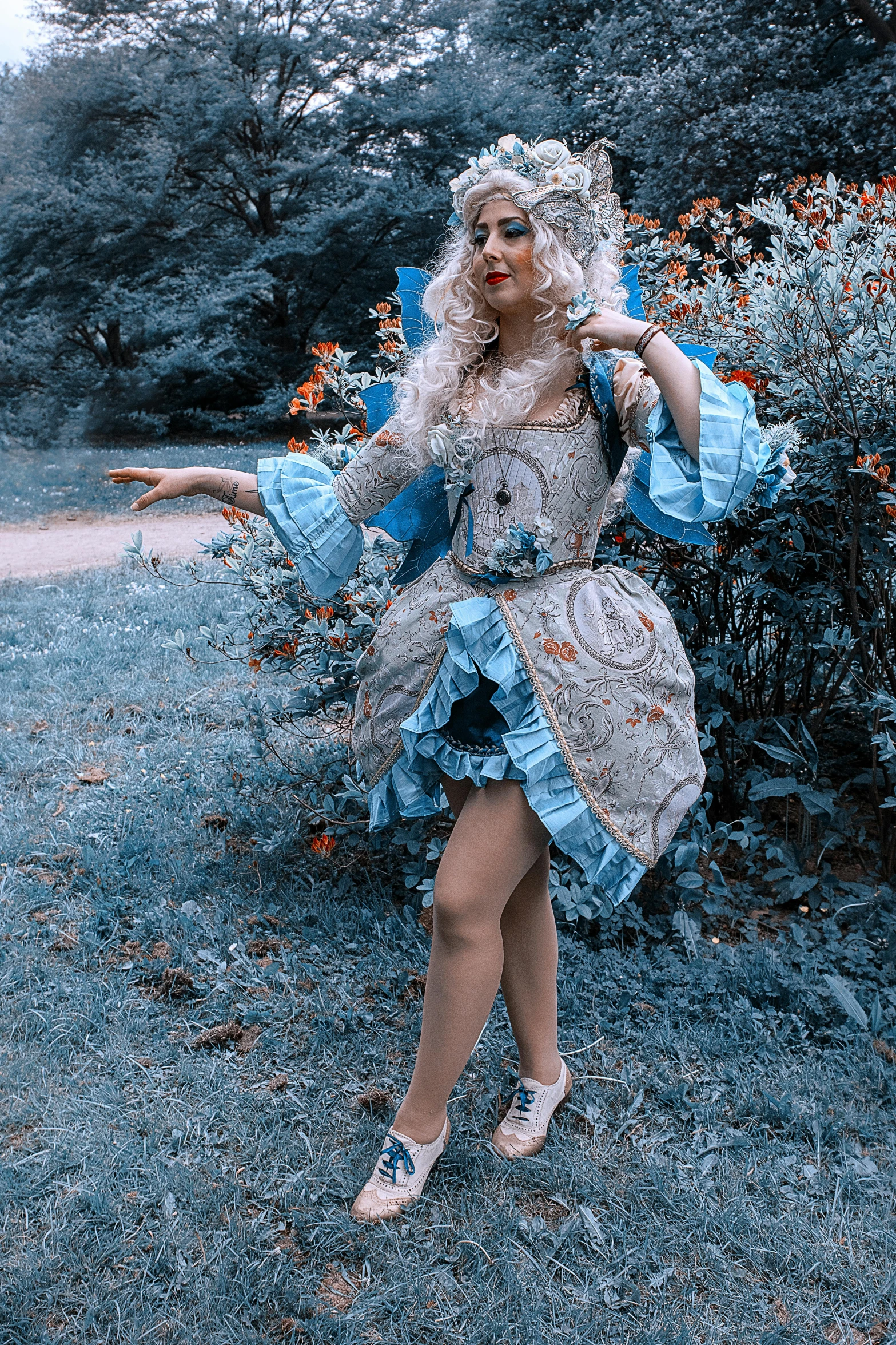 a woman that is standing in the grass, inspired by Jean-Baptiste van Loo, unsplash, rococo, ornate cosplay, gif, low quality photo, halloween