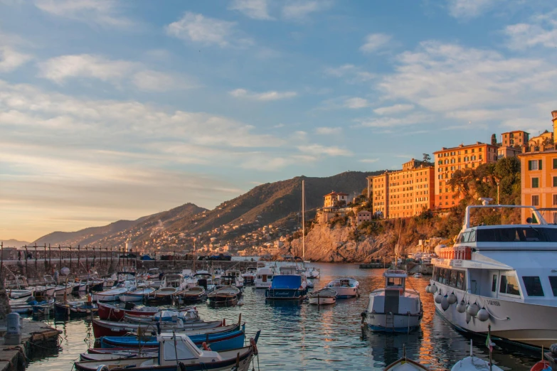 a number of boats in a body of water, pexels contest winner, renaissance, mediterranean vista, nice afternoon lighting, profile image, harbour in background