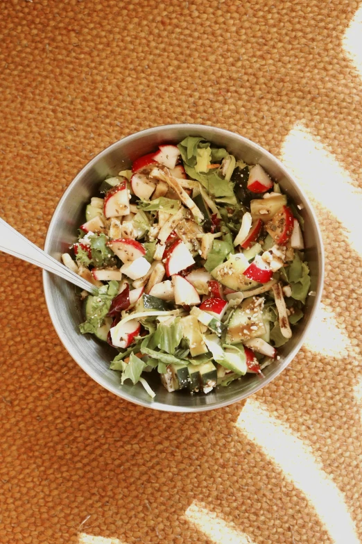 a bowl of salad sitting on top of a table, by Jessie Algie, square, full daylight, california;, detalied