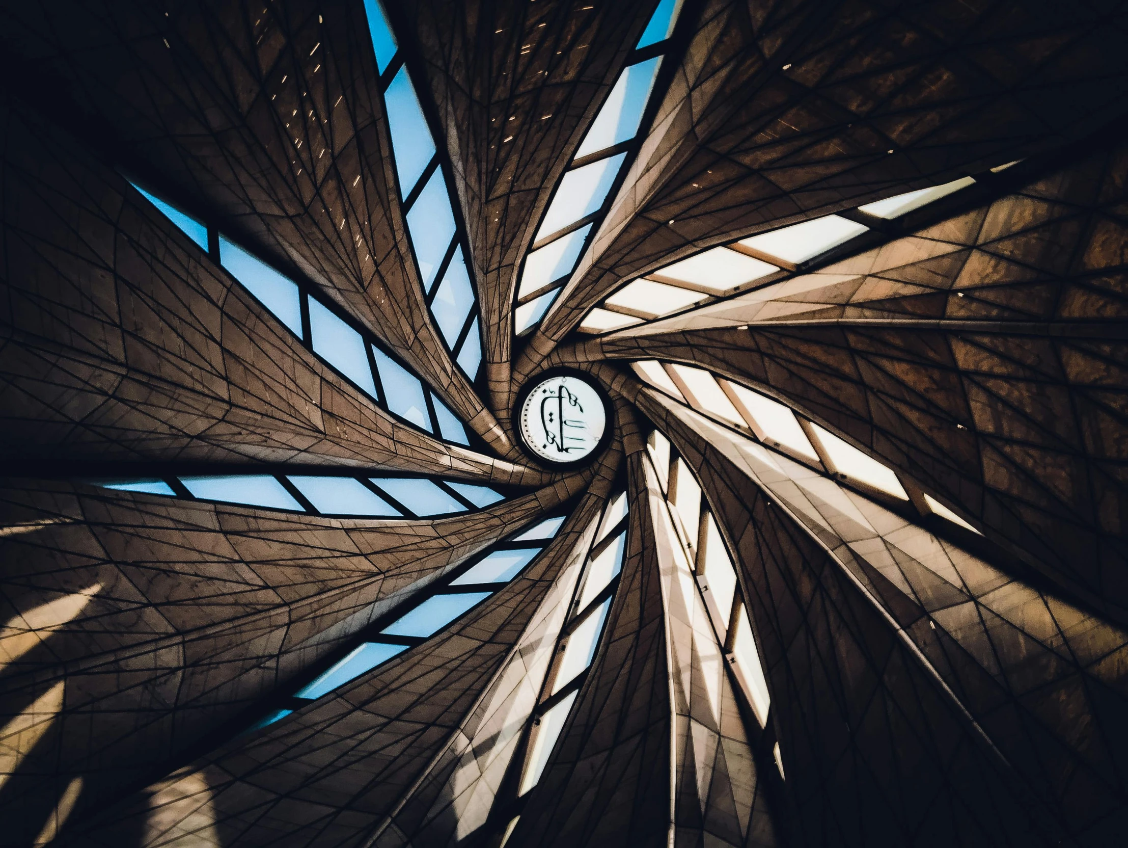 a spiral wooden structure with a blue sky in the background, inspired by Zha Shibiao, unsplash contest winner, cybermosque interior, ((fish eye)), behance lemanoosh, solar sails