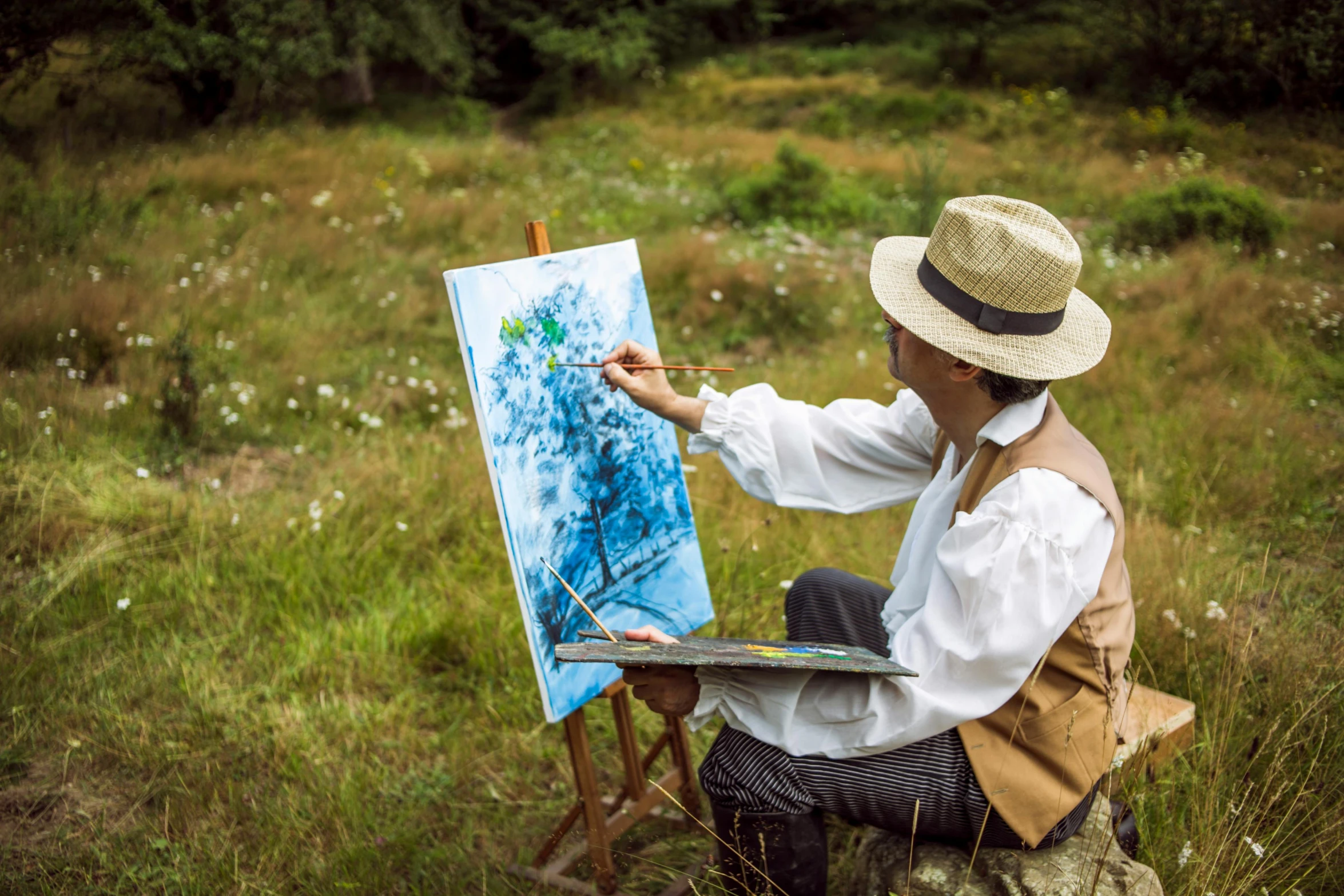 a woman in a hat is painting in a field, inspired by John Singer Sargent, pexels contest winner, visual art, painting of a man, al fresco, artist wearing overalls, carl spitzweg:7