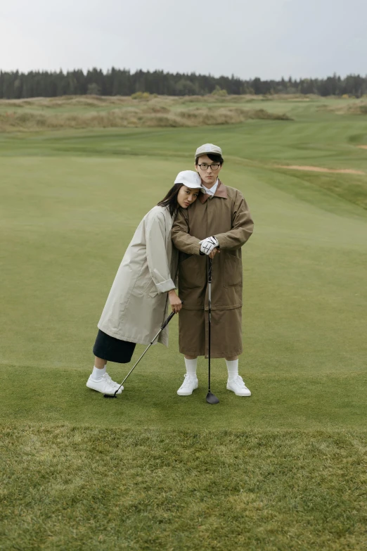 a man and woman standing next to each other on a golf course, by Adriaen Hanneman, unsplash, renaissance, outlive streetwear collection, sangsoo jeong, wes anderson style, thumbnail