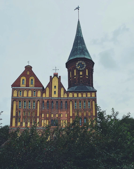 a tall building with a clock on top of it, a photo, by Jakob Gauermann, romanesque, red castle in background, thumbnail, trending on vsco, lower saxony