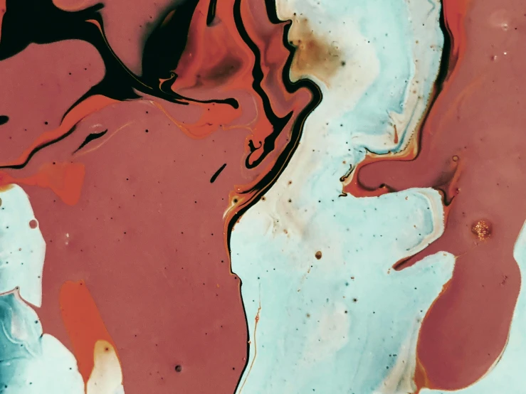 a close up of some paint on a piece of paper, inspired by Lucio Fontana, trending on pexels, chocolate river, teal silver red, marbled, thumbnail