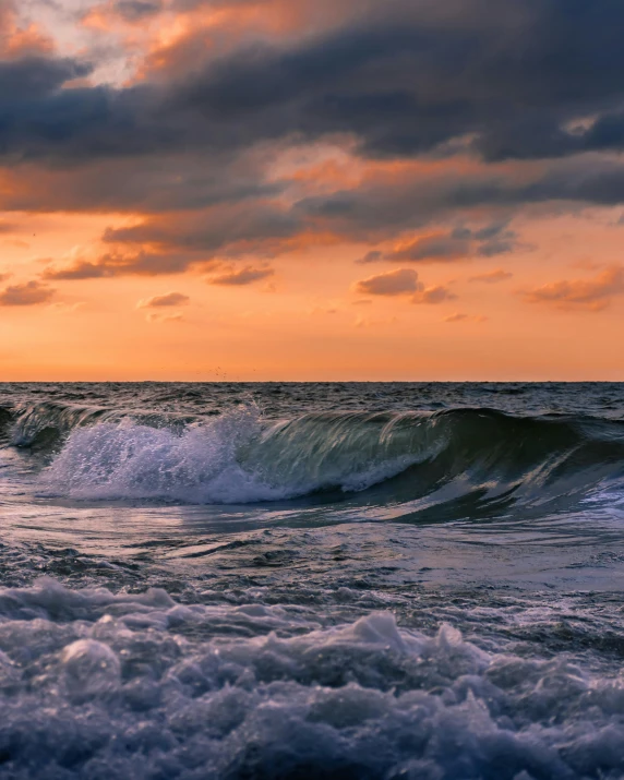 a man riding a surfboard on top of a wave in the ocean, by Jan Tengnagel, pexels contest winner, romanticism, sunset panorama, serene colors, storm in the evening, today\'s featured photograph 4k