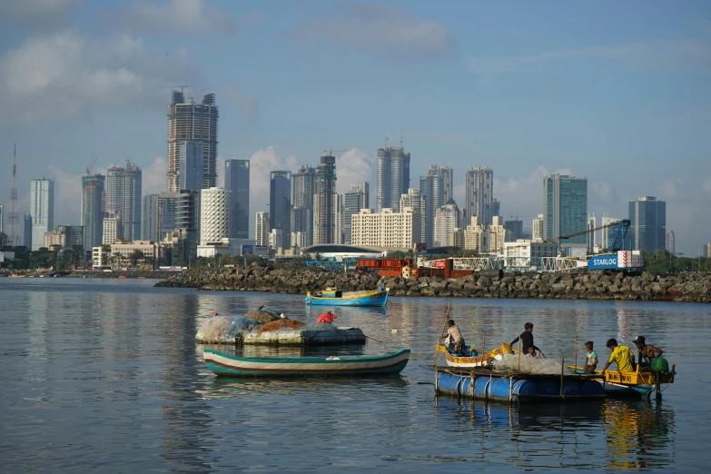 a group of boats floating on top of a body of water, by Carey Morris, pexels contest winner, hurufiyya, manila, harbour in background, avatar image