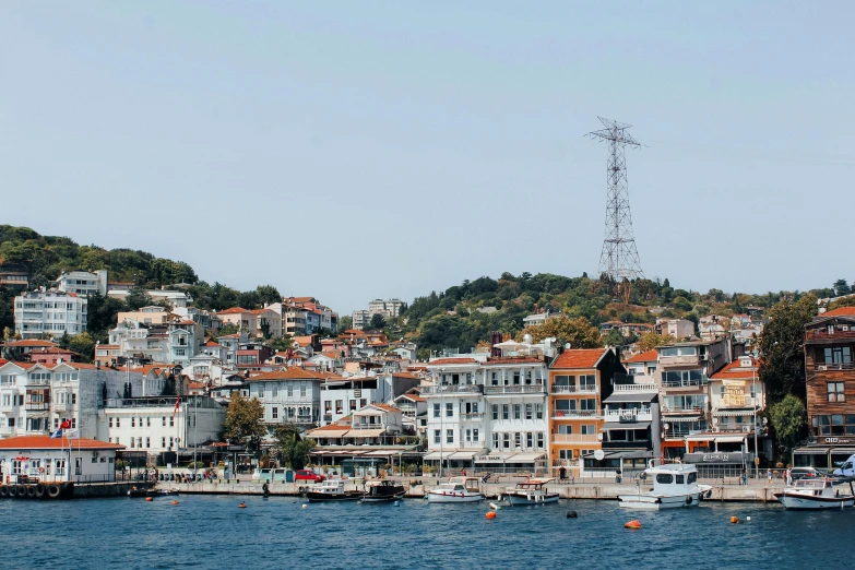 a large body of water filled with lots of boats, by Carey Morris, pexels contest winner, renaissance, fallout style istanbul, hillside, white buildings, 2000s photo