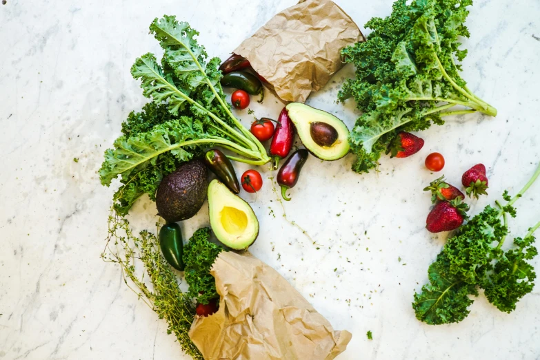 a number of fruits and vegetables arranged in a circle, a photo, pexels, parchment paper, lush greens, profile image, foil