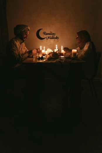 two men sitting at a table with lit candles, an album cover, by Elsa Bleda, pexels contest winner, muslim, ready to eat, ☁🌪🌙👩🏾, couple