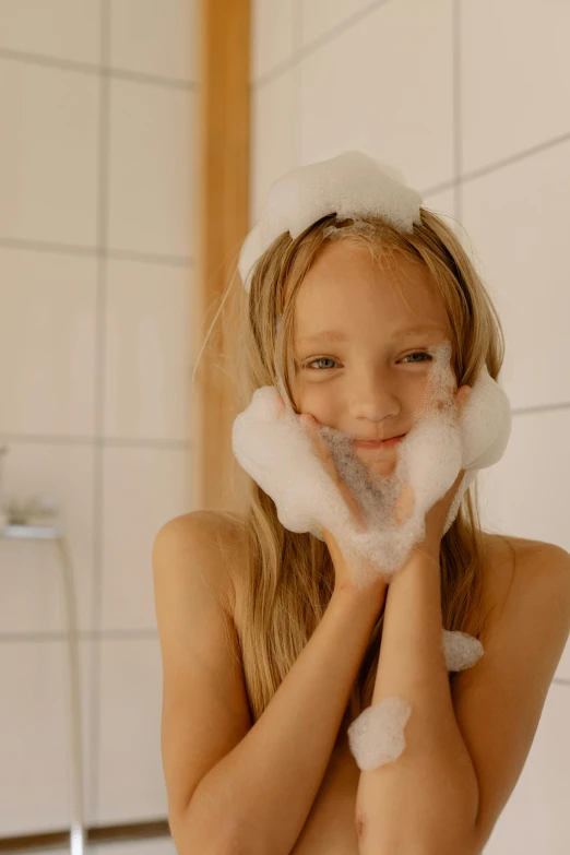 a girl in a bathtub with foam on her face, by Jakob Gauermann, unsplash, slide show, cute young girl, shower cap, video