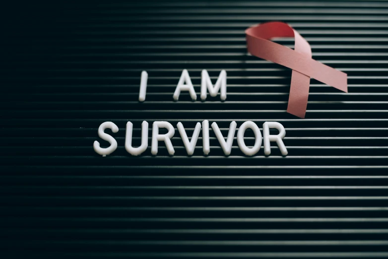 a red ribbon with the words i am survivor on it, a portrait, pixabay, multiple stories, pink, paul barson, lots of signs