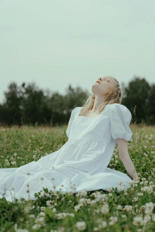 a woman in a white dress sitting in a field, pexels contest winner, renaissance, elle fanning), aurora aksnes, lie on white clouds fairyland, sunday afternoon