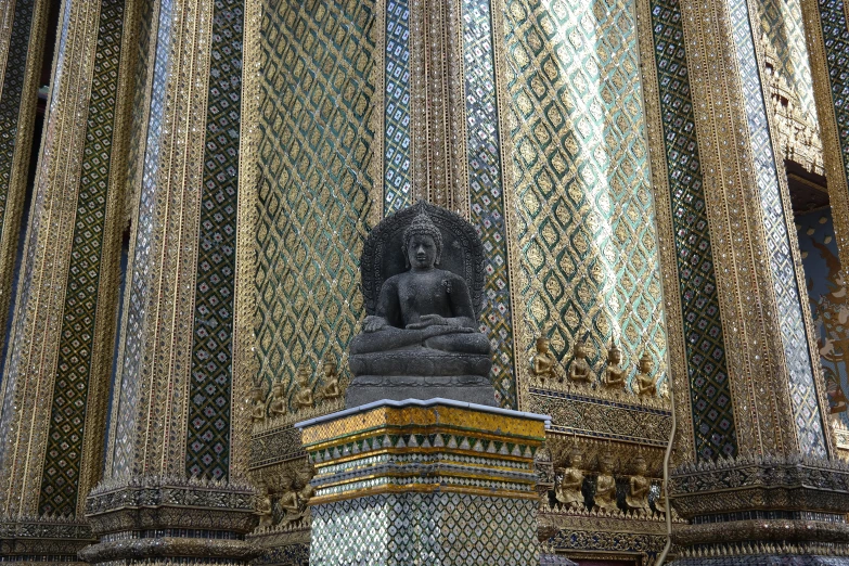 a close up of a statue in front of a building, pexels contest winner, cloisonnism, on a mosaic marble floor dais, south east asian with long, thumbnail, thai