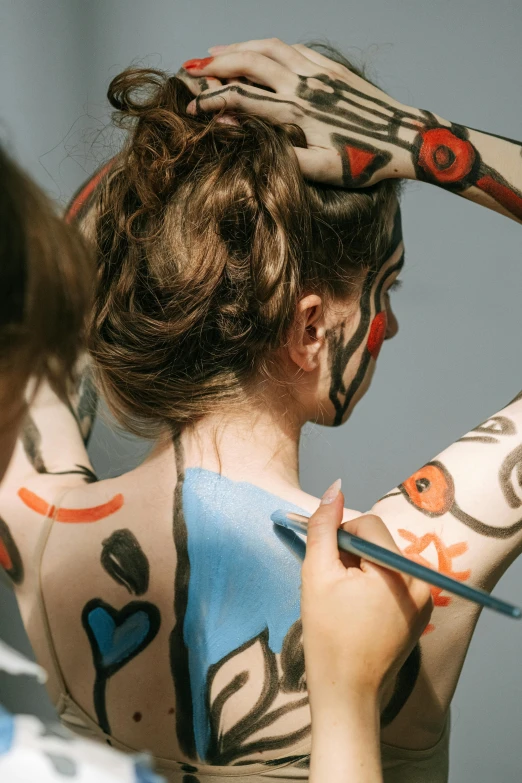 a woman that has some paint on her body, trending on pexels, process art, picasso masterpiece, children painting, geometrically realistic, promo image