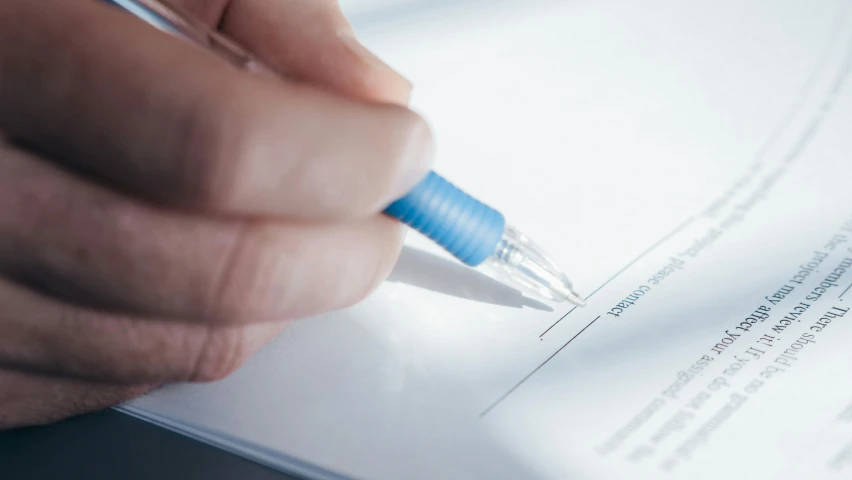 a person signing a document with a blue pen, highly detailed rounded forms, taken with sony alpha 9, cinematic detail, modeled