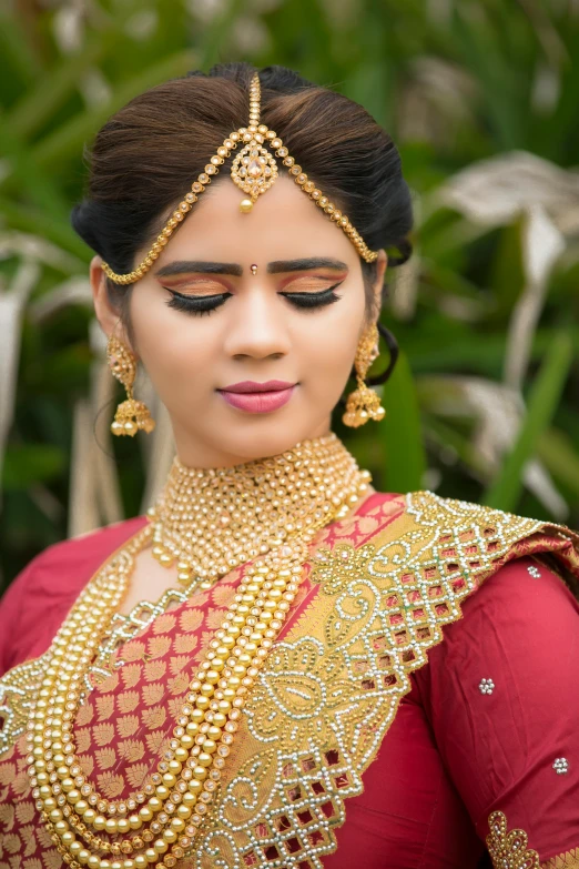 a woman in a red blouse and gold jewelry, trending on cg society, hurufiyya, assamese aesthetic, thumbnail, bride, square