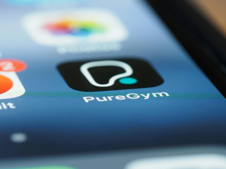 a close up of a cell phone with various apps on it, by Paul Bird, purism, background a gym, simple logo, square, pure aura