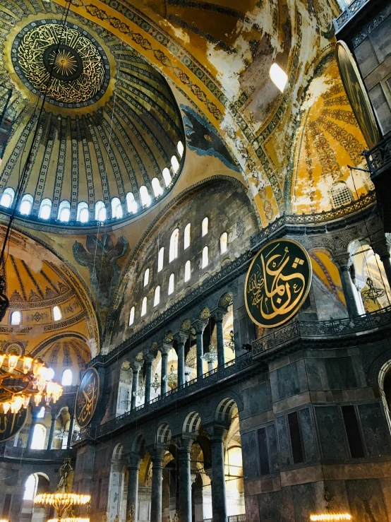 a group of people standing inside of a building, a mosaic, trending on unsplash, baroque, with great domes and arches, ottoman sultan, thumbnail, ( ( theatrical ) )