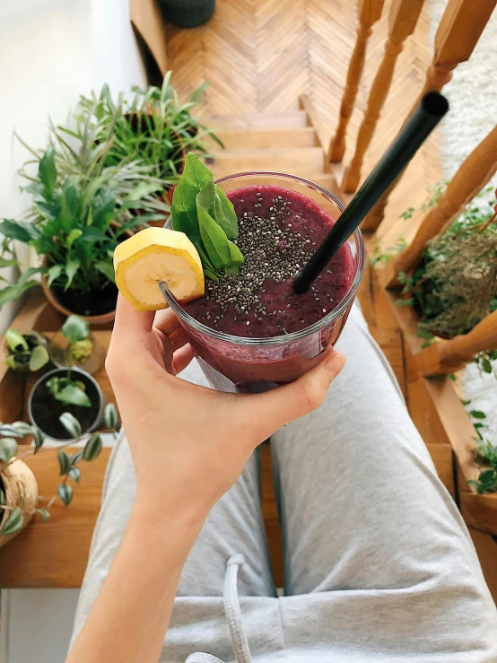 a close up of a person holding a drink, fruit, 🎀 🗡 🍓 🧚, striking pose, greens)