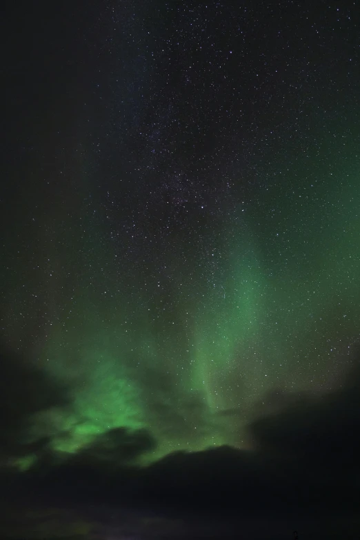 the aurora lights in the sky above a body of water, by Ejnar Nielsen, pexels contest winner, hurufiyya, square, cloud nebula, black and green, seasonal